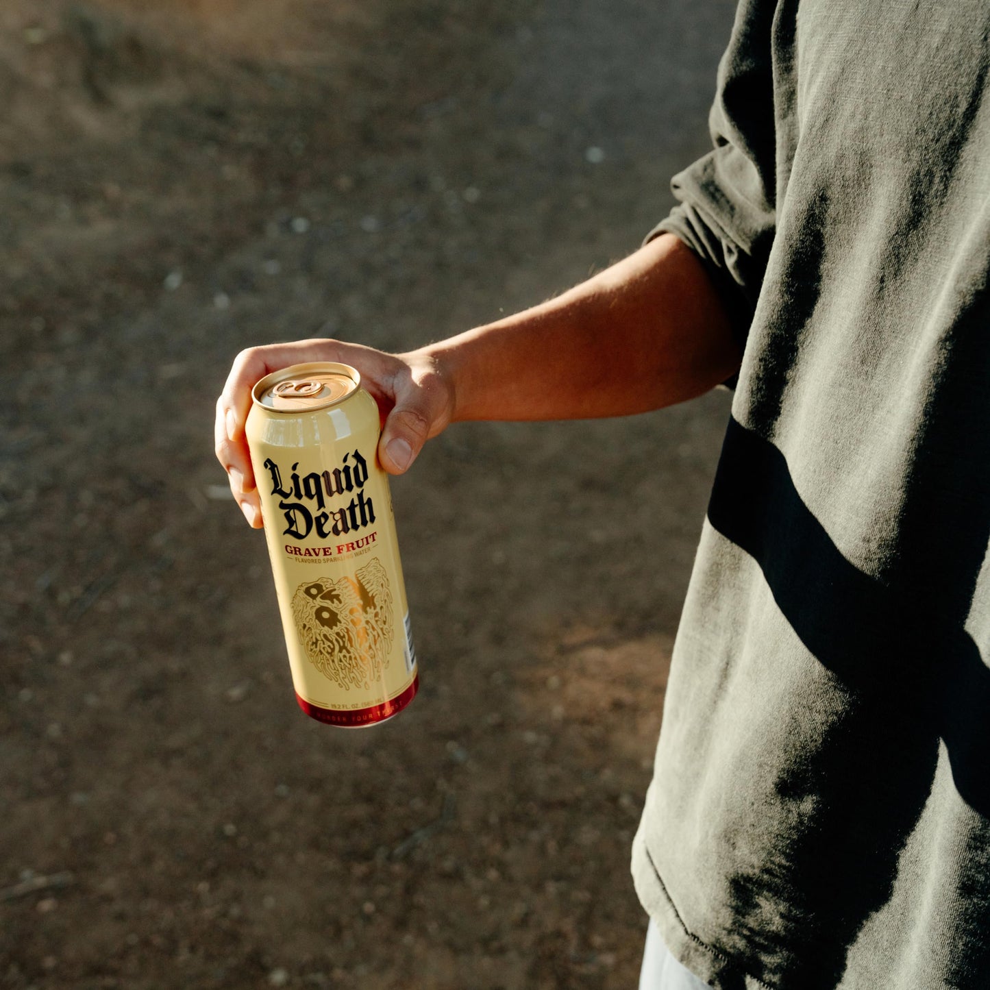 Liquid Death, Grave Fruit Sparkling Water, 8-Pack (King Size 19.2Oz Cans), Grapefruit Flavored Sparkling Beverage Sweetened With