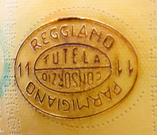 Parmigiano Reggiano - Grated Cheese - 1 Pound Ground Fresh Daily.
