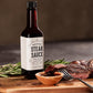 Man Crates Steak Night Crate – Solid Wood Steak Plates, Stainless Steel Cutting Tool, Steak Charms, Seasonings & Sauces – Ultimate Steak Gift Set