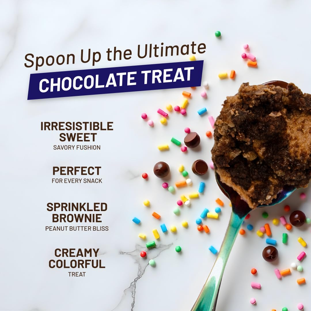 Rainbow Nut Butter Cosmic Fudge Brownie Peanut Butter Treat Chocolate, With Rich Chunks Of Brownie, Rainbow Sprinkles, And Velve