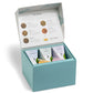 Tea Forte Wellbeing 3-Piece Premium Tea Gift Set With Light Blue Cafe Cup With Lid, Tea Tray And 10 Assorted 2 Of Each Variety O
