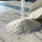 DecoPac Sanding Sugar | White Edible Sugar Sprinkles | 33oz | Edible Sanding Sugar in Handheld Container | Made In USA | Sugar S