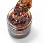 Hot Crispy Oil, An all natural unique blend of fresh fried shallots, fresh garlic and a proprietary blend of three different chi
