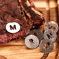 Man Crates Steak Night Crate – Solid Wood Steak Plates, Stainless Steel Cutting Tool, Steak Charms, Seasonings & Sauces – Ultimate Steak Gift Set