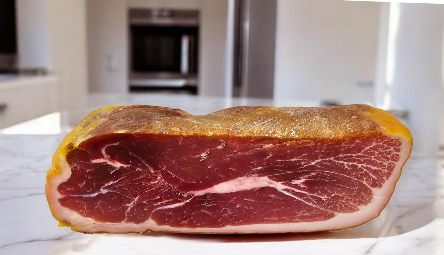 Imported Premium Prosciutto Aged 14 Months Boneless 4 Pound Cut. Hand Selected And Cut From The Leg.