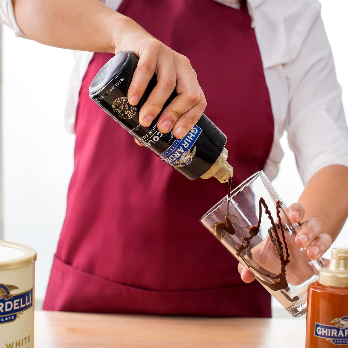 Ghirardelli Sea Salt Caramel and Chocolate Flavored Sauce 16 oz Squeeze Bottles (Pack of 2) with Ghirardelli Stamped Barista Spo