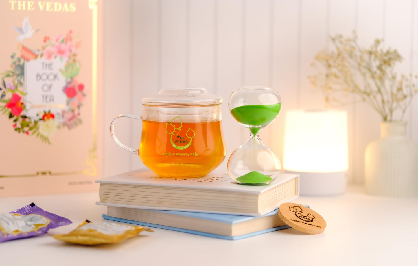 The Vedas Tea Chest Enhanced Tea Gift Set | 48 Handstitched Cotton Teabags | 12 Flavours | 1 The Vedas Branded Mug With Infuser | 1 Sand Clock Specially Designed For Our Teas | 1 Coaster