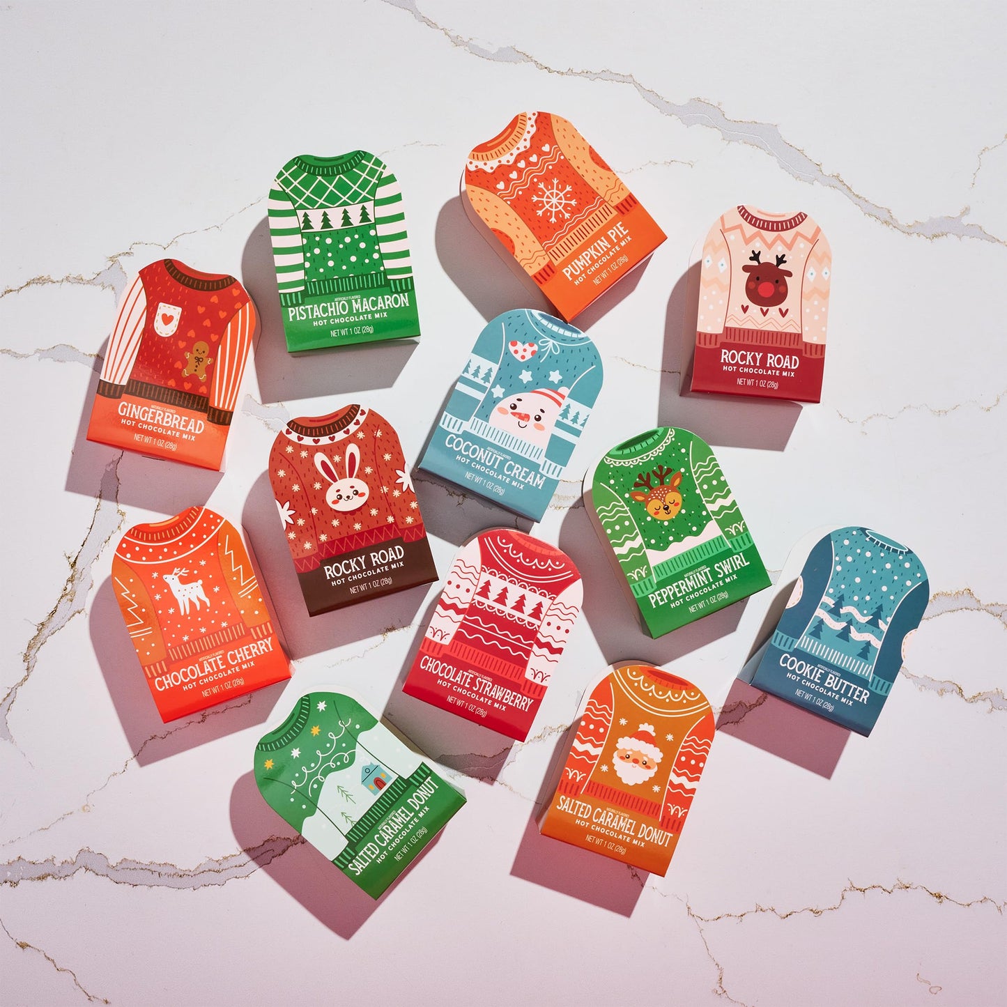 Thoughtfully  Holiday Hot Chocolate Mix Gift Set  Ugly Sweater Cocoa Sampler with 12 Flavored Packets Including Peppermint  Gingerbread  Rocky Road & More  Christmas Gift Box  Set of 12
