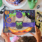 Cauldron Cookie Decorating Kit - Halloween Cookie Kit with 8 Pre-Baked Vanilla Cookies, White Icing, Glittery Sugar, Edible Acce