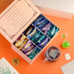 The Vedas Tea Chest Enhanced Tea Gift Set | 48 Handstitched Cotton Teabags | 12 Flavours | 1 The Vedas Branded Mug With Infuser | 1 Sand Clock Specially Designed For Our Teas | 1 Coaster