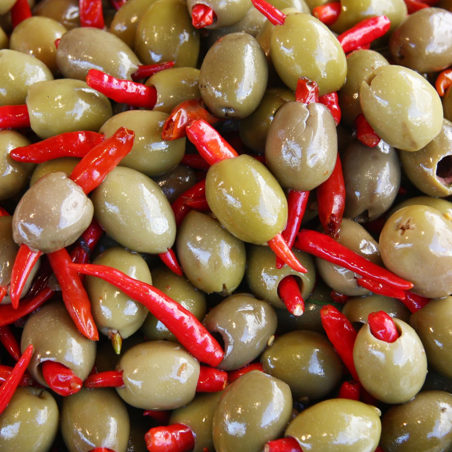 Sanniti Piri Piri Peppers Stuffed greek Olives Net Weight 16 oz - Drained Weight 10 oz (Pack of 2)