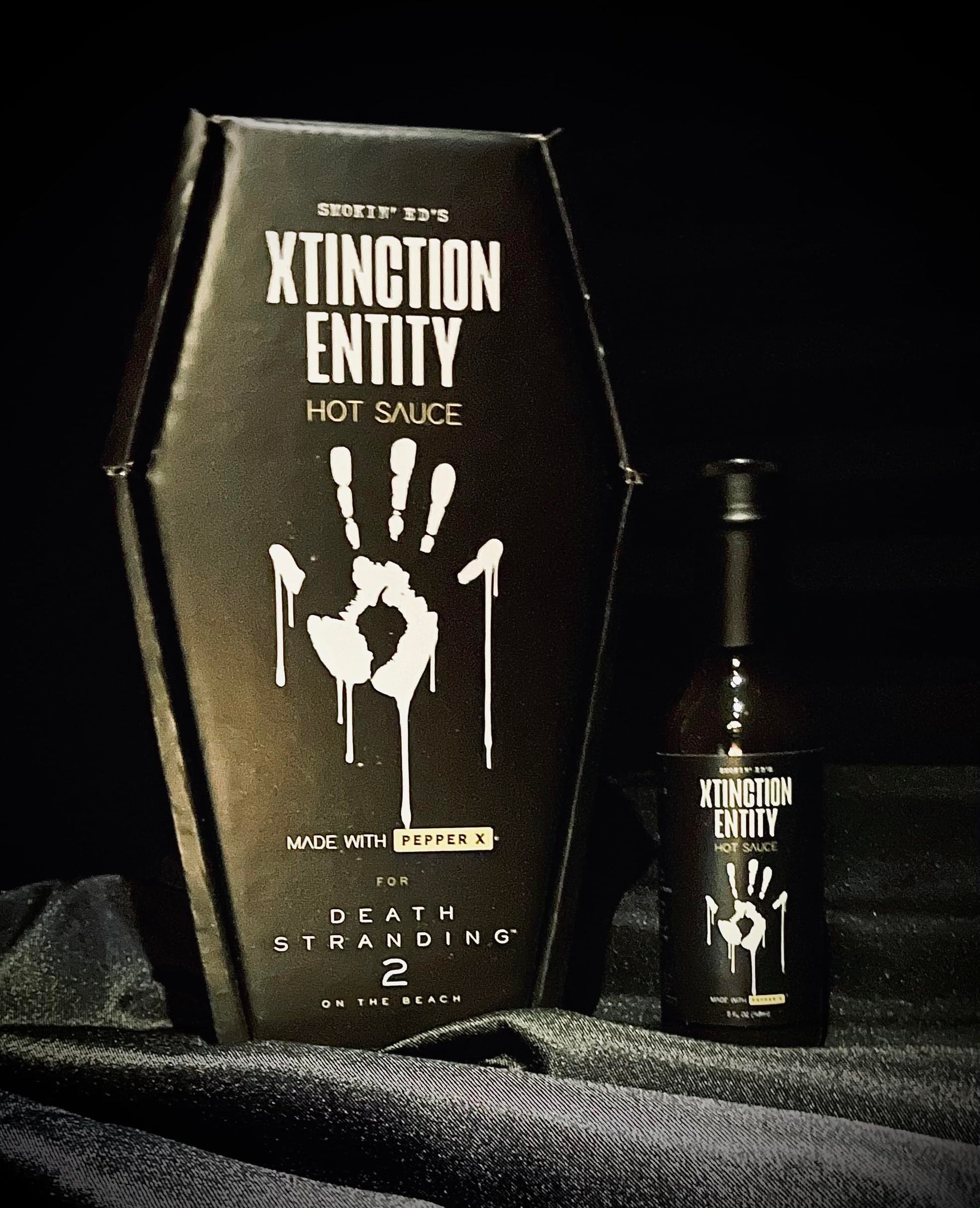 Puckerbutt x Smokin Eds Xtinction Entity Pepper X Hot Sauce Gift Box (Playstations Death Stranding 2)