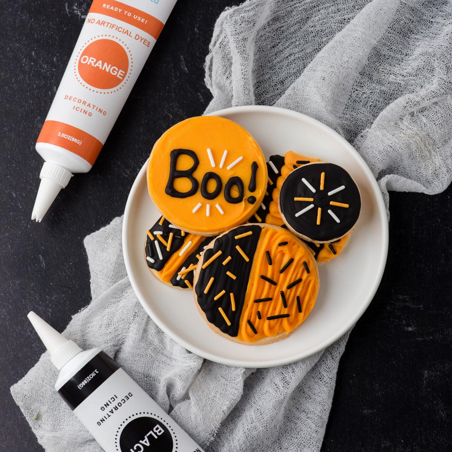 Sweets Indeed Dye-Free Halloween Frosting & Sprinkles Set - 8.22 oz | 2 Frosting Tubes (Orange & Black) + 2 Decorating Tips + 2 oz Sprinkle Mix (Black  Orange & White) | No Artificial Dyes Cupcake & Cookie Decorating Kit