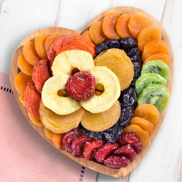 A Gift Inside Dried Fruit On Heart Bamboo Serving Tray