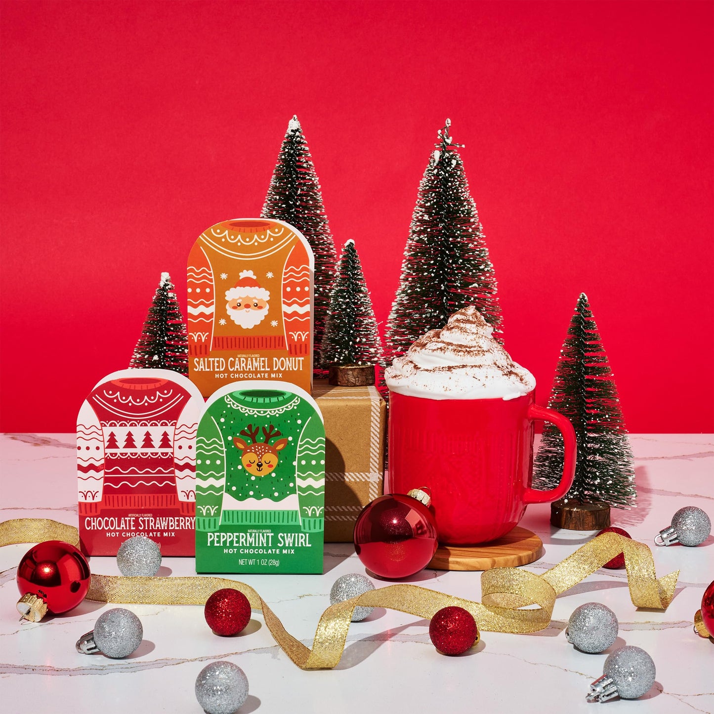 Thoughtfully  Holiday Hot Chocolate Mix Gift Set  Ugly Sweater Cocoa Sampler with 12 Flavored Packets Including Peppermint  Gingerbread  Rocky Road & More  Christmas Gift Box  Set of 12