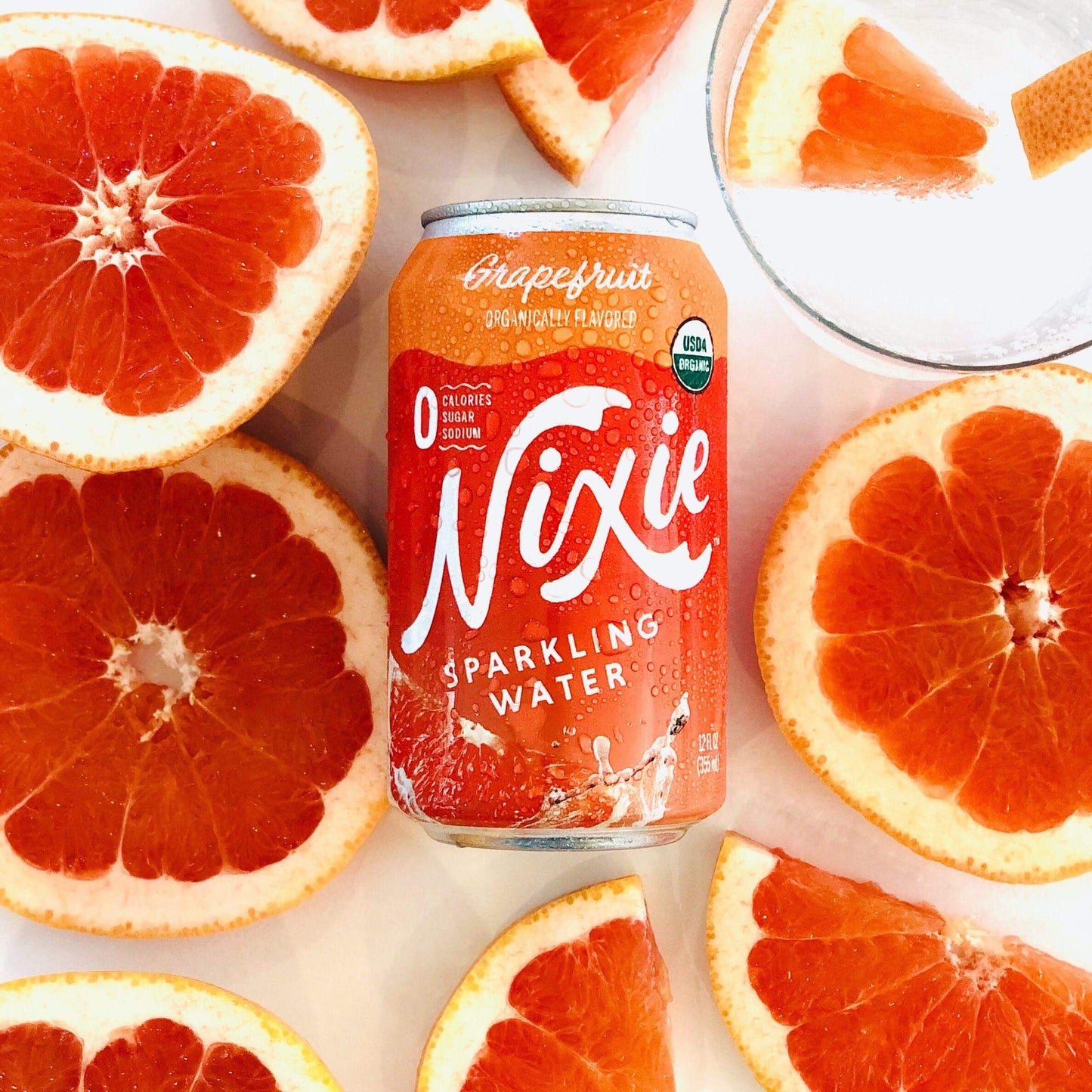 Nixie Sparkling Water, Grapefruit | 12 Fl Oz Cans, 24 Pack | Organic, Vegan, Non-Gmo, Gluten Free, 0 Calories, 0 Sugar, 0 Sodium