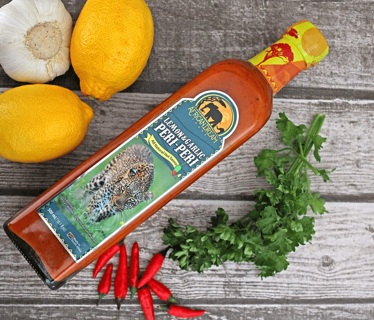 AFRICAN DREAM FOODS Lemon & Garlic Peri-Peri Hot Sauce, All-Natural Sweet and Spicy, 16.9 fl oz, Big Chefs Bottle