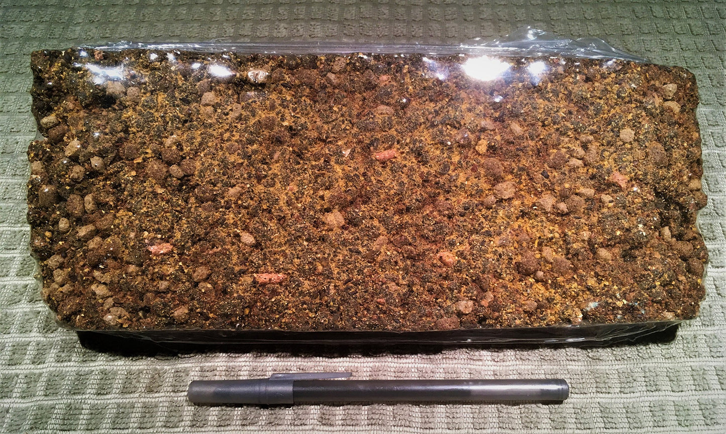 Carolina Cottonseed Oil Mealcake Large Size. Hang It Out By Your Dock Or Throw It In Your Favorite Fishing Hole. Rock Hard Meal Cake Makes For S-L-O-W Food Release